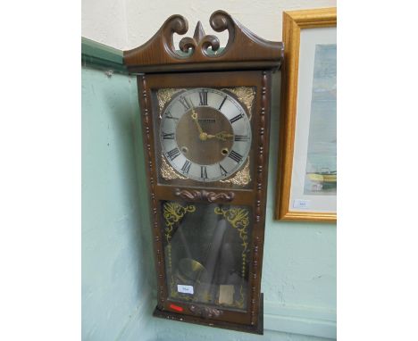 Modern rectangular cased "President" wall clock with steel dial and brass pendulum 