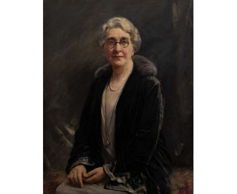Frank C King (act.1911-1929)Portrait of Mrs Richard Speight wearing spectacles and fur trimmed cloak, signed, oil on canvas, 