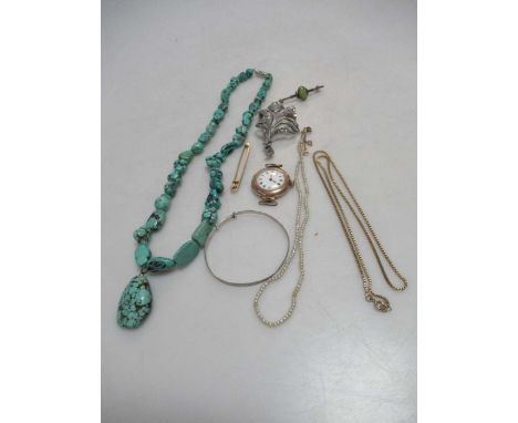 A hallmarked gold chain, a watch head hallmarked 9ct gold and a brooch tested to at least 9ct gold, gross weight (inc watch m