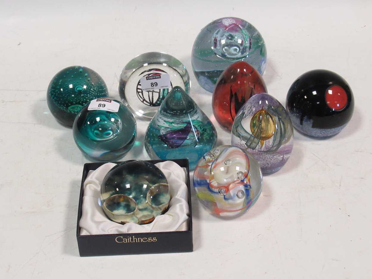 Ten Caithness glass paperweights, numbered limited editions in