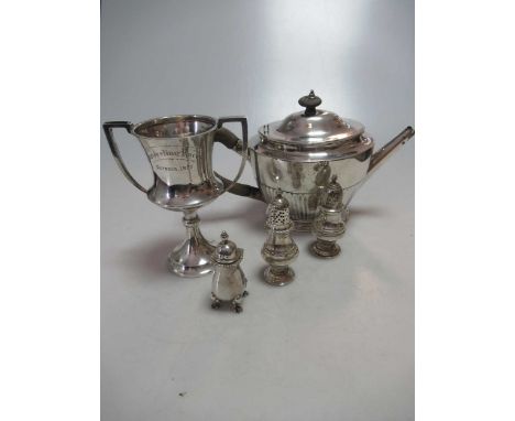 A Georgian silver teapot, mark of Robert Hennell, London 1787, together with three silver pepperettes and a silver trophy, 24