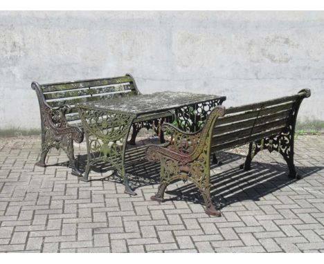 Two cast iron frame garden benches and a table.Table 65 x 124 x 68.5cm. Bench 126cm wide (3)