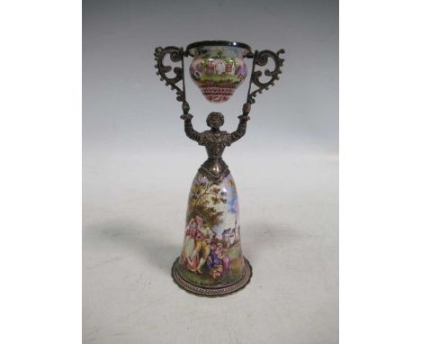 A Continental painted enamel female form wager cup