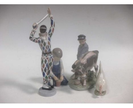 A Bing &amp; Grondahl model of Harlequin together with a B&amp;G model of a young boy gardening and two Royal Copenhagen mode