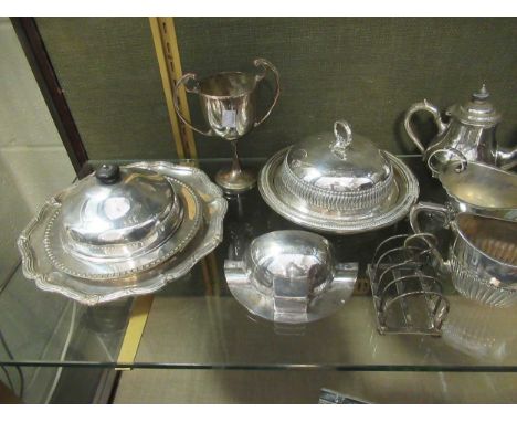 A large collection of silverplated ware including bowls, teapot, muffineers, flatware, condiments etc