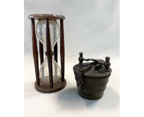 dated 1799 or 1755, (2 missing), 10cm high; together with a 19th century sand timer, 18cm high