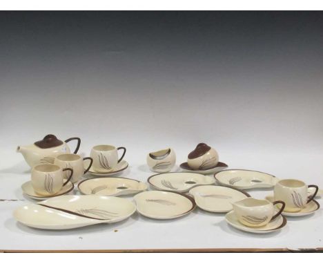 Carlton Ware Australian Design tea wares and Clarice Cliff Newport Pottery green and gilt lined part service including teapot