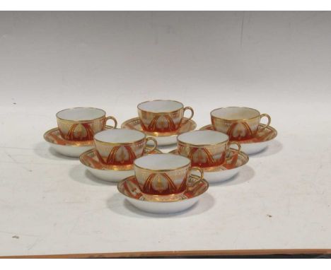 Spode tea and coffee service, early 19th century, in orange and gilt, pattern no. 670, 20 saucers, 10 tea cups, 11 coffee can