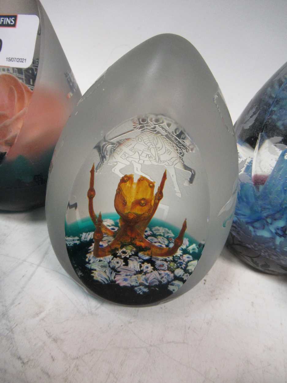 Ten Caithness glass paperweights, numbered limited editions in