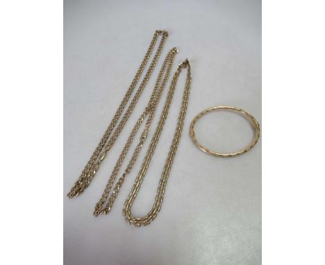 Three hallmarked 9ct gold chains together with a bangle stamped '375', gross weight 37.3g (4)