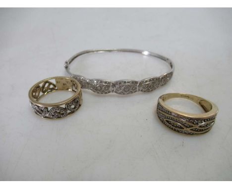 Two hallmarked 9ct gold rings, together with a hallmarked 9ct gold bangle, gross weight 15.4g (3)