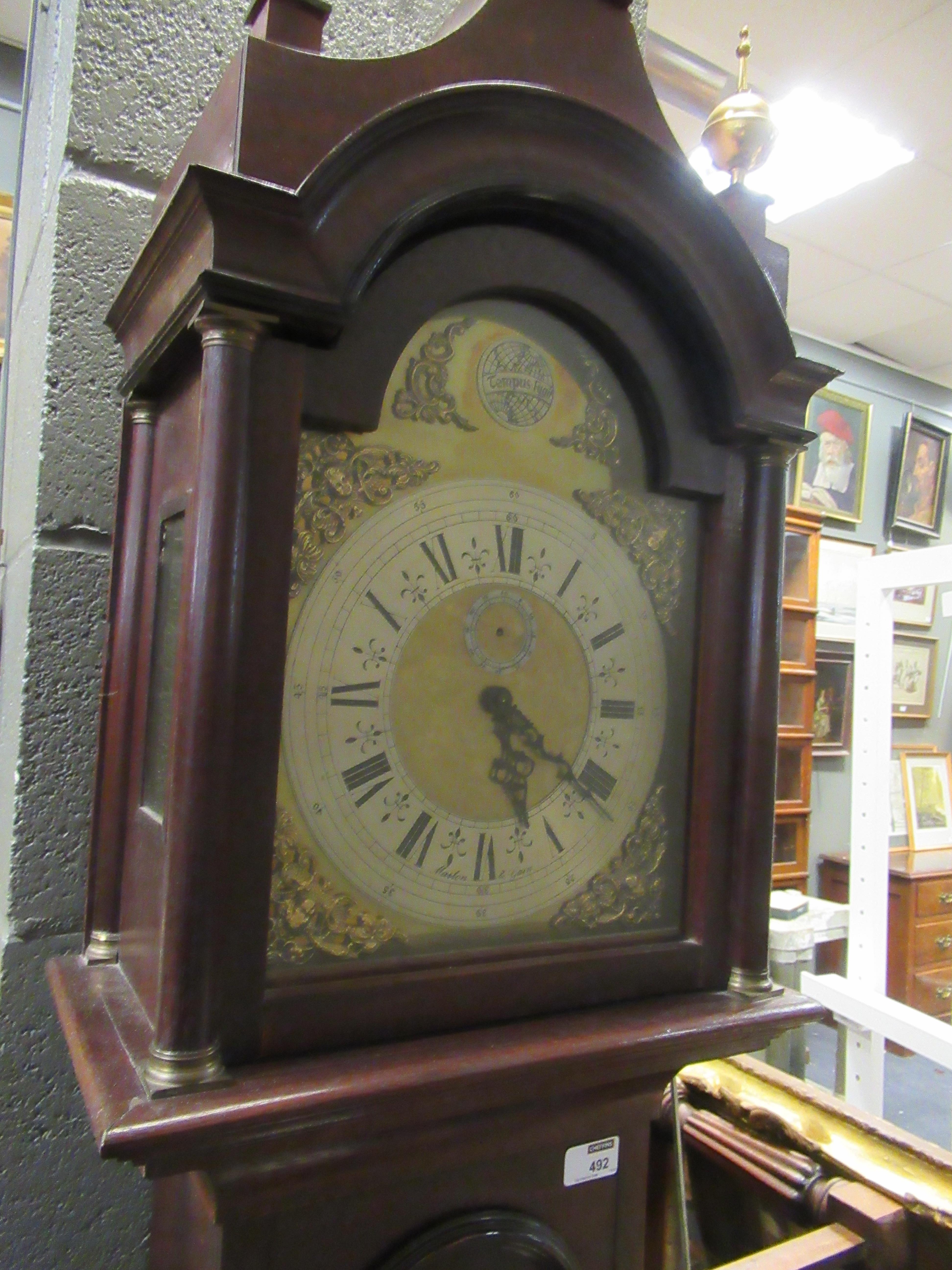 A reproduction chiming grandmother size longcase clock with brass dial