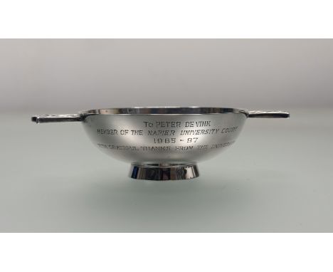 A modern Hamilton &amp; Inches Edinburgh silver quaich with cletic knot lugs and engraved inscription To Peter De Vink member