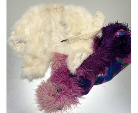 A French Vintage white feather evening wrap, a pink feather trimed multi-coloured scarf together with a white feather. (3)