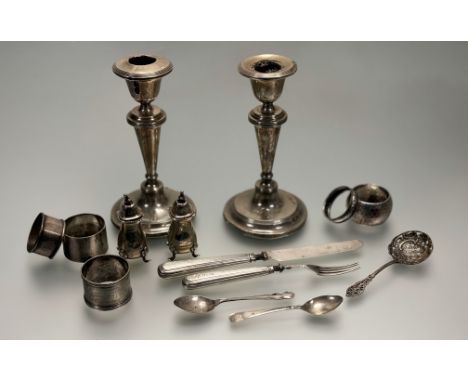 A collection of silver to include, a pair of Birmingham silver candle sticks with weighted bases a/f: h. x 18cm, a pair of Sh