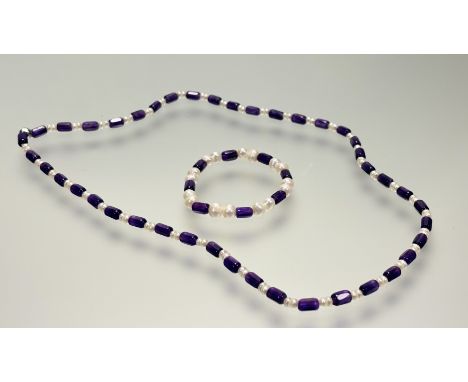 A Chinese freshwater cultured pearl necklace and barrel faceted amethyst bead necklace with magnetic clasp fastening: l. x 32