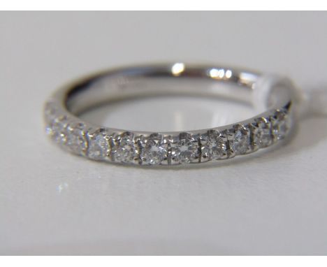 PLATINUM &amp; DIAMOND HALF ETERNITY RING, platinum ring set 12 well matched round brilliant cut diamonds, of good colour and