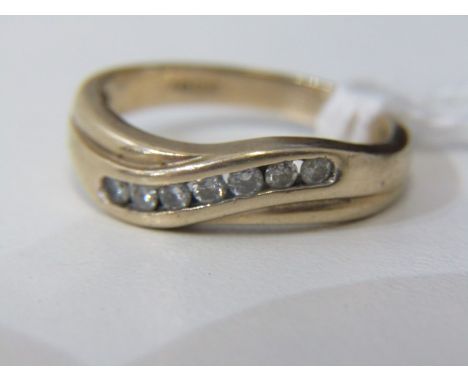 CROSSOVER RING, with round briliant cut channel set diamonds, size O