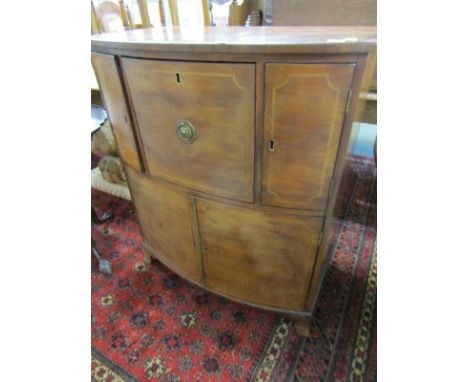 HEPPLEWHITE WINE CABINET, cross banded mahogany bow front wine cellarette cabinet, central storage cupboard, above twin door 