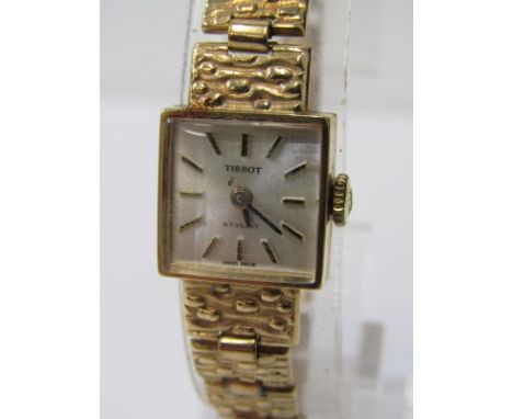 LADY'S TISSOT GOLD WATCH, lady's square faced watch in a 9ct gold case on a 9ct gold strap, with original Tissot retail box, 