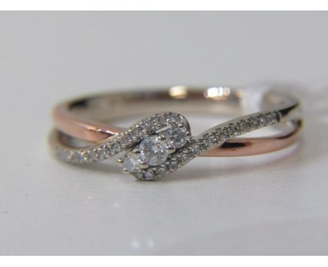 DIAMOND TWIST RING, 14ct yellow and white gold diamond twist ring, size Q/R