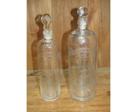 ANTIQUE GLASS BOTTLES, 2 etched glass gin decanter bottles "Croix d'Honneur, Geneva", 26cm height 349 - larger bottle with so