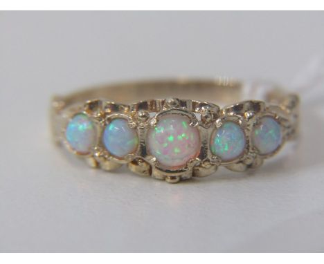 OPAL RING, a 9ct yellow gold ring set with 5 graduated opals, size N
