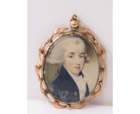GOLD PORTRAIT LOCKET, yellow gold portrait locket (tests as 9ct) with oval form portrait of a 19th Century Gentleman, 5.5cm, 