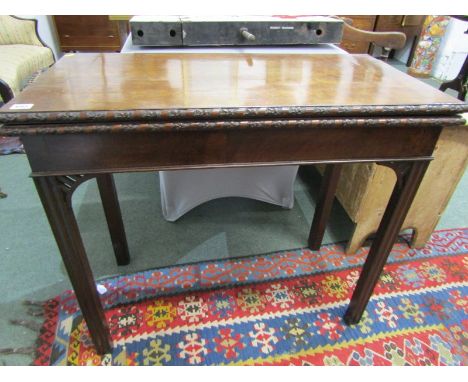 GEORGIAN MAHOGANY FOLD TOP CARD TABLE, chamfered legs and florette carved edge detail, 86cm width