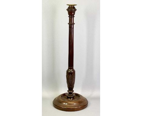 A TALL TURNED MAHOGANY CANDLESTICK - early 19th century, the column fluted and carved with wheatsheafs on circular dish base 