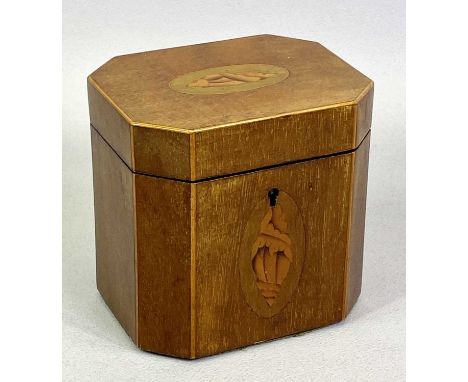 GEORGE III MAHOGANY TEA CADDY - of cube form with canted corners, the hinged cover and front inlaid with oval shell motifs, 1