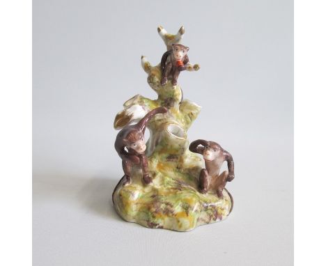A Staffordshire Spill ring holder with three playful MonkeysDate: circa 1840-50Size: 7cm diameter, 11.5cm highWeight: 200 gra