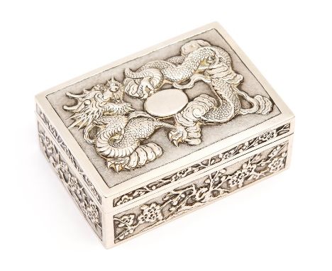 A Chinese 800 standard silver box and cover, the cover chased with three claw dragon in relief entwined around vacant cartouc