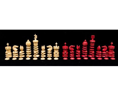A late 19th Century turned bone Barleycorn chess set, red stained and natural and of typical form, kings 9cm high.Condition: 