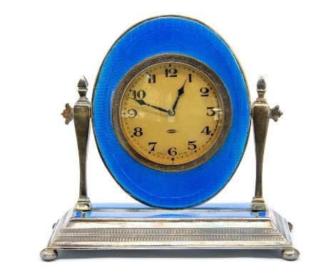 A George V (Art Deco) silver mounted and enamel desk clock in the manner of  dressing table mirror, the 8 day Swiss Made cloc