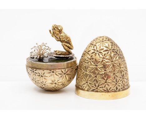 Stuart Devlin silver gilt surprise 'frog in the pond' egg, decorative flower textured form, opening to reveal a leaping frog 