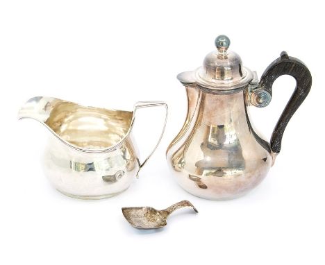 A collection of silver to include: George III silver oval cream jug, with reeded handle and rim, the bulbous body engraved wi