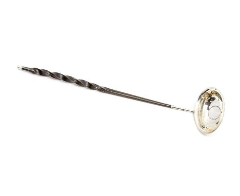 A George III silver toddy ladle with twisted horn handle, the bowl inset with a Georgian silver guinea dated 1787, apparently