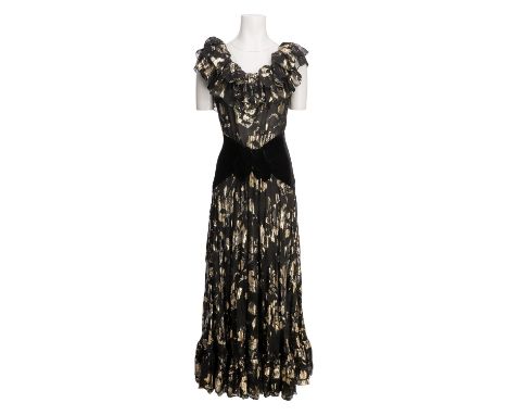 YVES SAINT LAURENT VINTAGE Robe, Gr. ca. 34, Koll: Herbst/ Winter 1982/1983 (Robe 106). Schwarzes, bodenlanges Modell aus tra