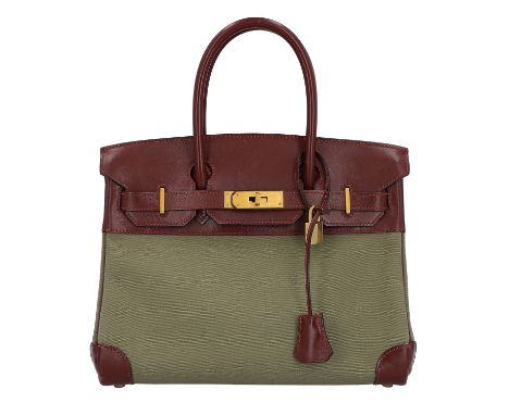 HERMÈS VINTAGE Handtasche "HAUT À COURRIERE - HAC 28". Koll. 1994. Sehr seltene Größe 28. Korpus aus burgunderrotem Leder und