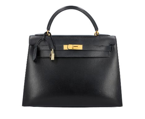 HERMÈS VINTAGE Handtasche "KELLY BAG 32". Koll. 1999. Boxcalfleder in Schwarz mit vergoldeter Hardware. Klassisches Modell mi