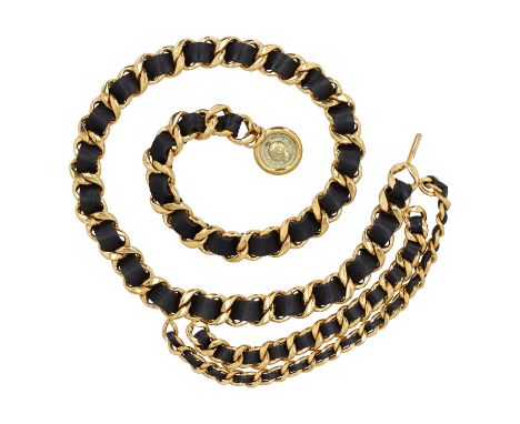 CHANEL VINTAGE Gliederkettengürtel, Länge ca 90cm. Kollektion 1995. Gliederkettenriemen in Goldfarben mit schwarzem Leder dur