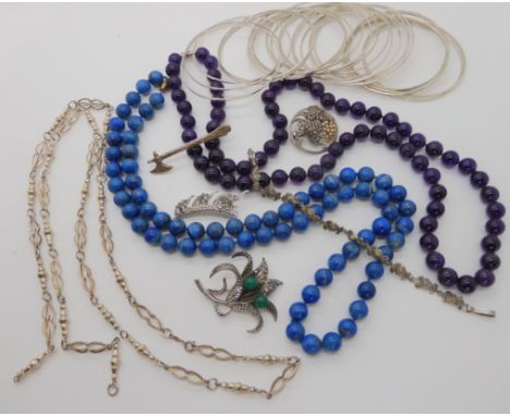 Silver bangles, Robert Allison axe brooch, amethyst and lapis lazuli beads and other items Condition Report: No condition rep