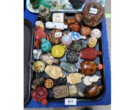 A collection of assorted snuff bottles and netsuke etc Condition Report: Available upon request