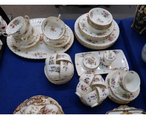 A Minton Marlow pattern dinner service, comprising six dinner plates, medium plates, side plates, soup coupes and saucers, te