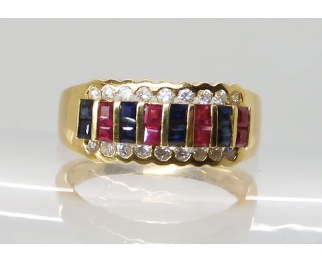 An 18ct gold ruby, sapphire and diamond ring size O, weight 5.5gms With insurance documents for £1200 Condition Report: Avail