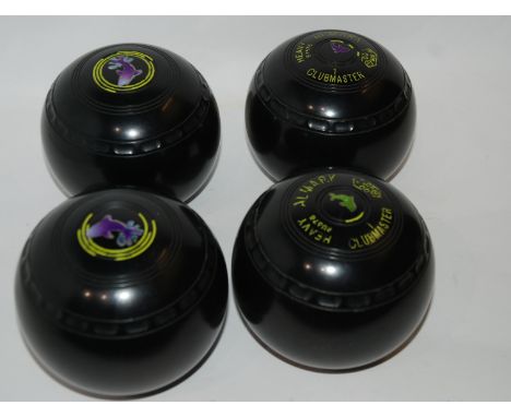 A set of four Almark modern lawn bowls and 12 volume of Children's Britannica in book trough Condition Report: Available upon