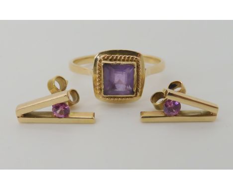 A pair of yellow metal pink gem set earrings together with a yellow metal amethyst set ring, size W, weight combined 5.1gms C