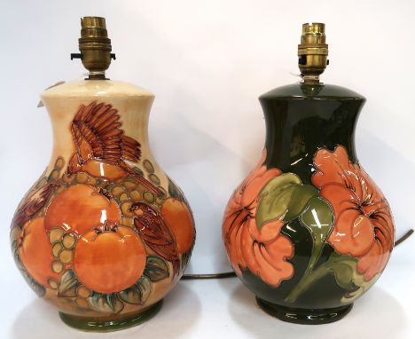 A Moorcroft Finches pattern table lamp and a Hibiscus pattern table lamp Condition Report: Available upon request