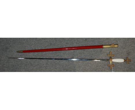 A Masonic sword in red scabbard, apron in case, sash etc Condition Report: Available upon request